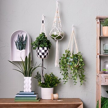 faux plants in containers and hanging planters